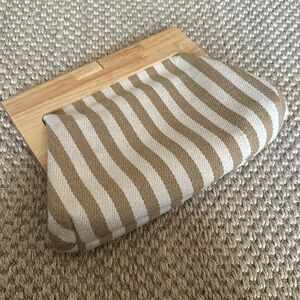 Paloma Clutch Khaki white striped with real wood finishing.